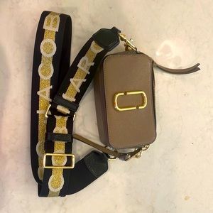 Gently used Marc Jacobs camera bag.